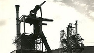 Black and white image of an industrial structure at a factory